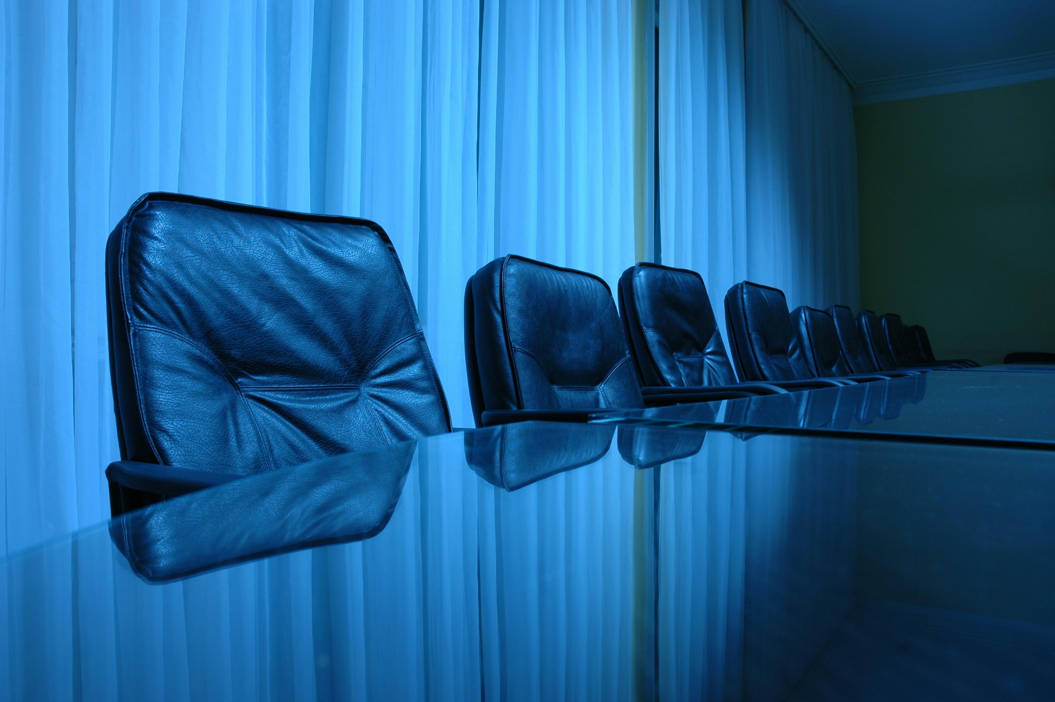 Empty board room, blue tone, business concept