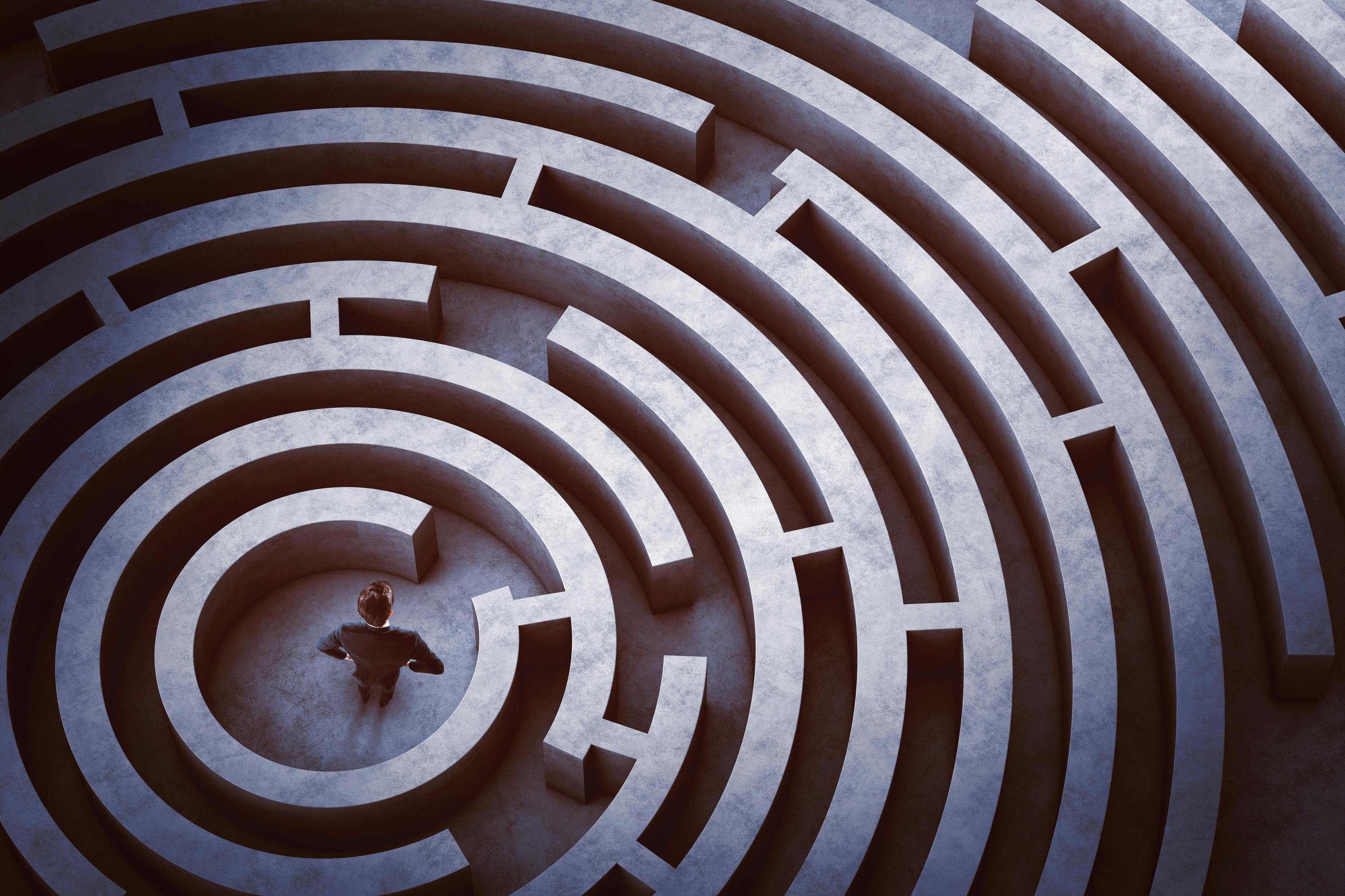Businessman at the center of a maze