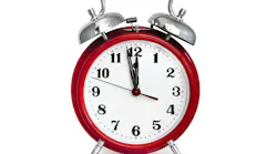 Old red alarm clock, showing two minutes to midnight. Isolated on white. Old red alarm clock, showing two minutes to midnight. Isolated on white.