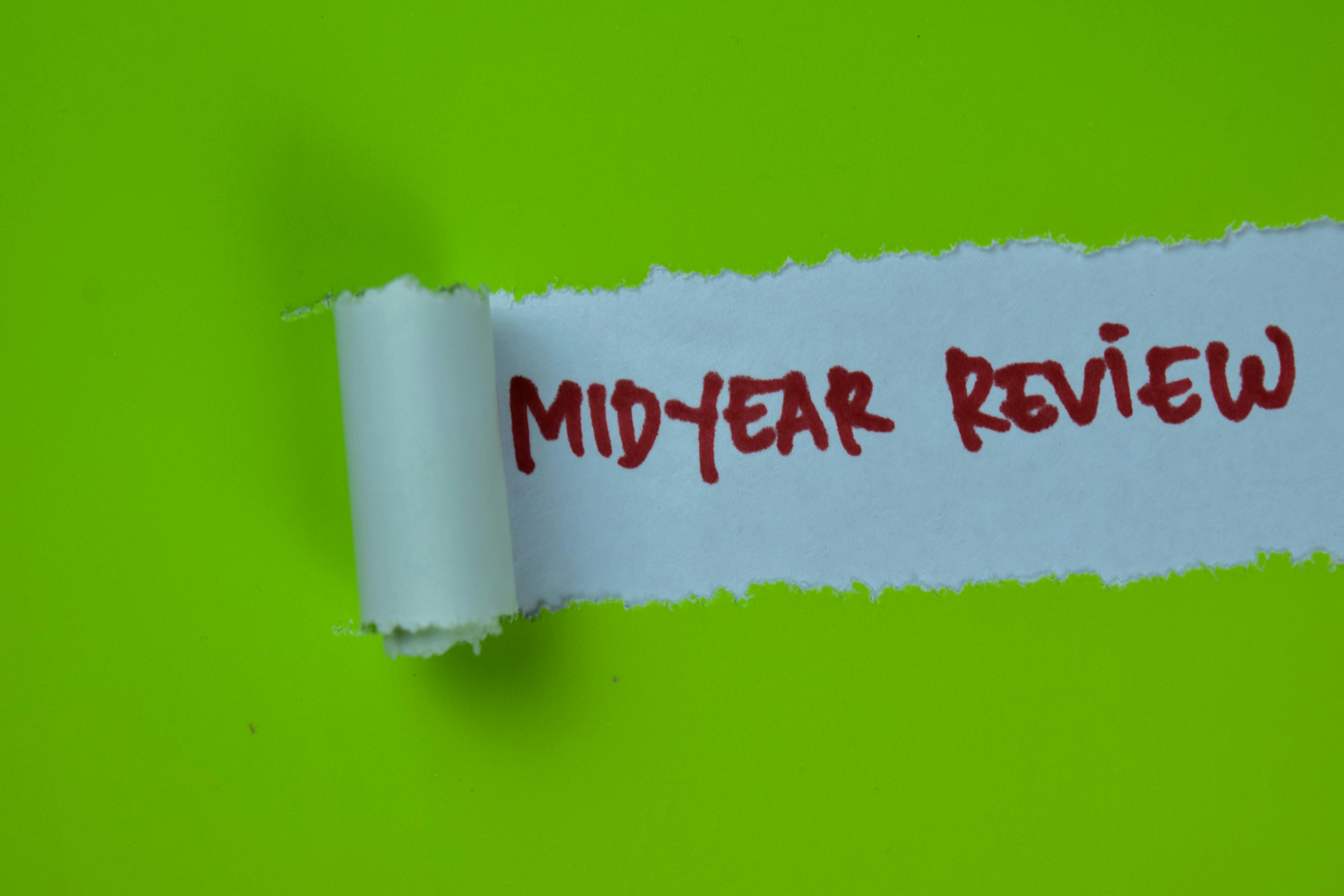 Midyear Review Text written in torn paper