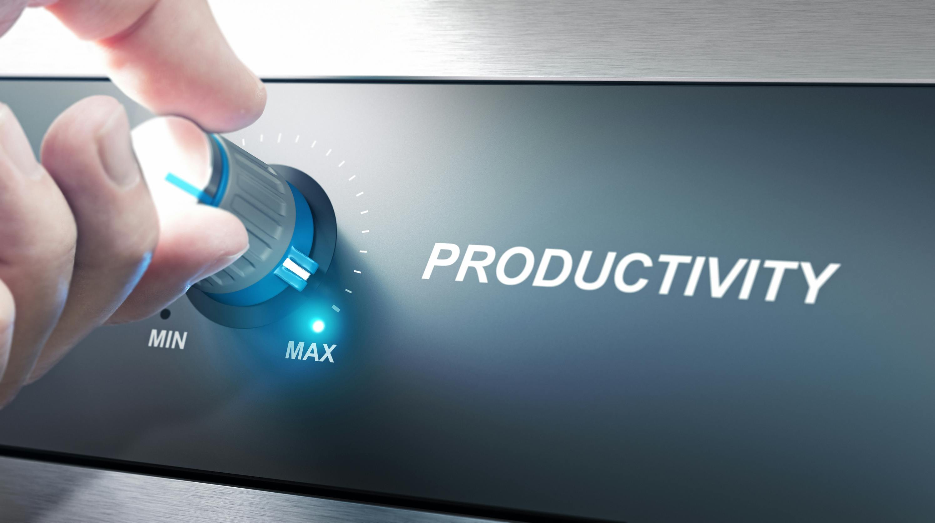 Hand turning a productivity knob. Concept for productivity management.