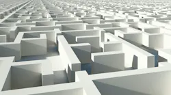 Image of figure sitting in maze