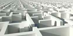 Image of figure sitting in maze