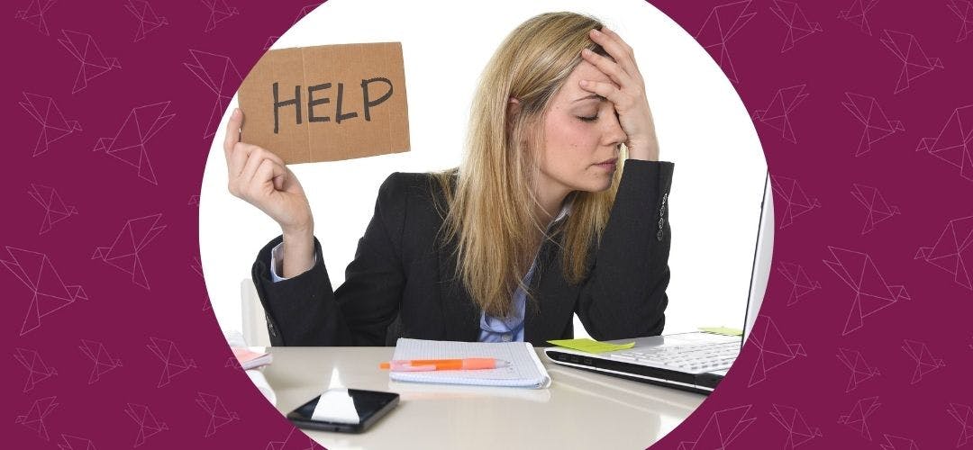 Frustrated marketing professional at computer