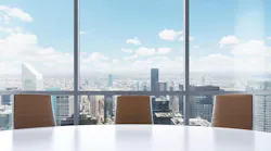 Panoramic conference room in modern office, New York city view from the windows. Close-up of the brown chairs and a white round table. 3D rendering. Panoramic conference room in modern office, New York city view from the windows. Close-up of the brown chairs and a white round table. 3D rendering.