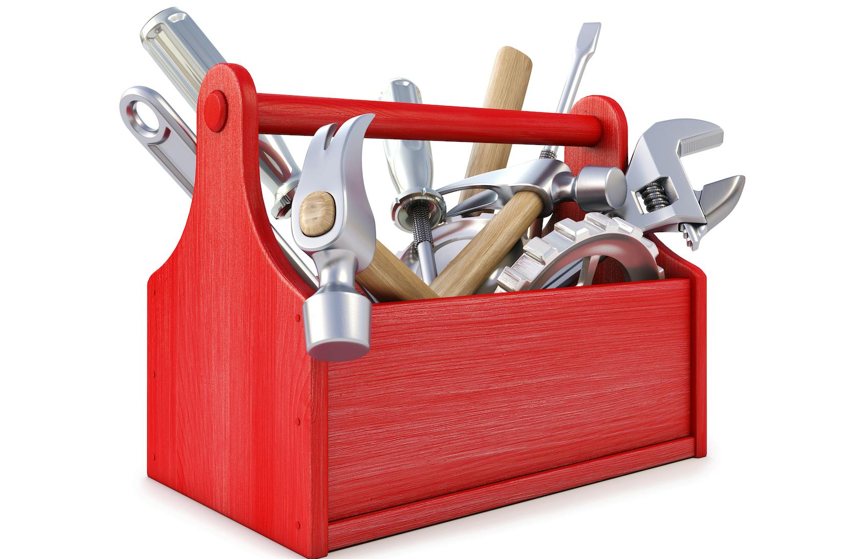 Wooden toolbox with tools.