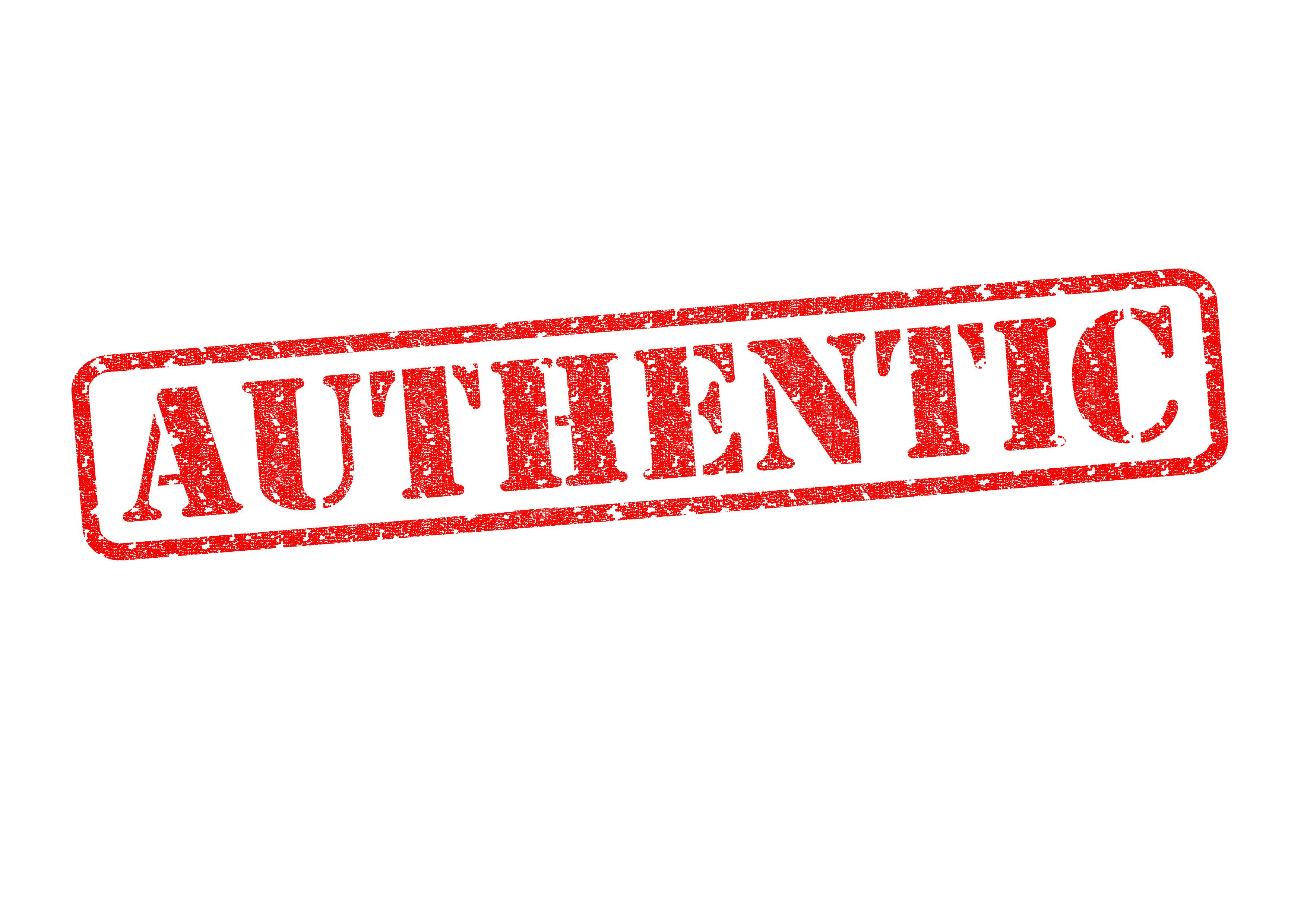 AUTHENTIC red rubber stamp over a white background.
