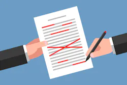 Concept of text editing, error correcting and proofreading. One hand is holding text document, another hand are editing content with red pen.