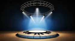 Empty music stage illuminated by spotlights at blue background