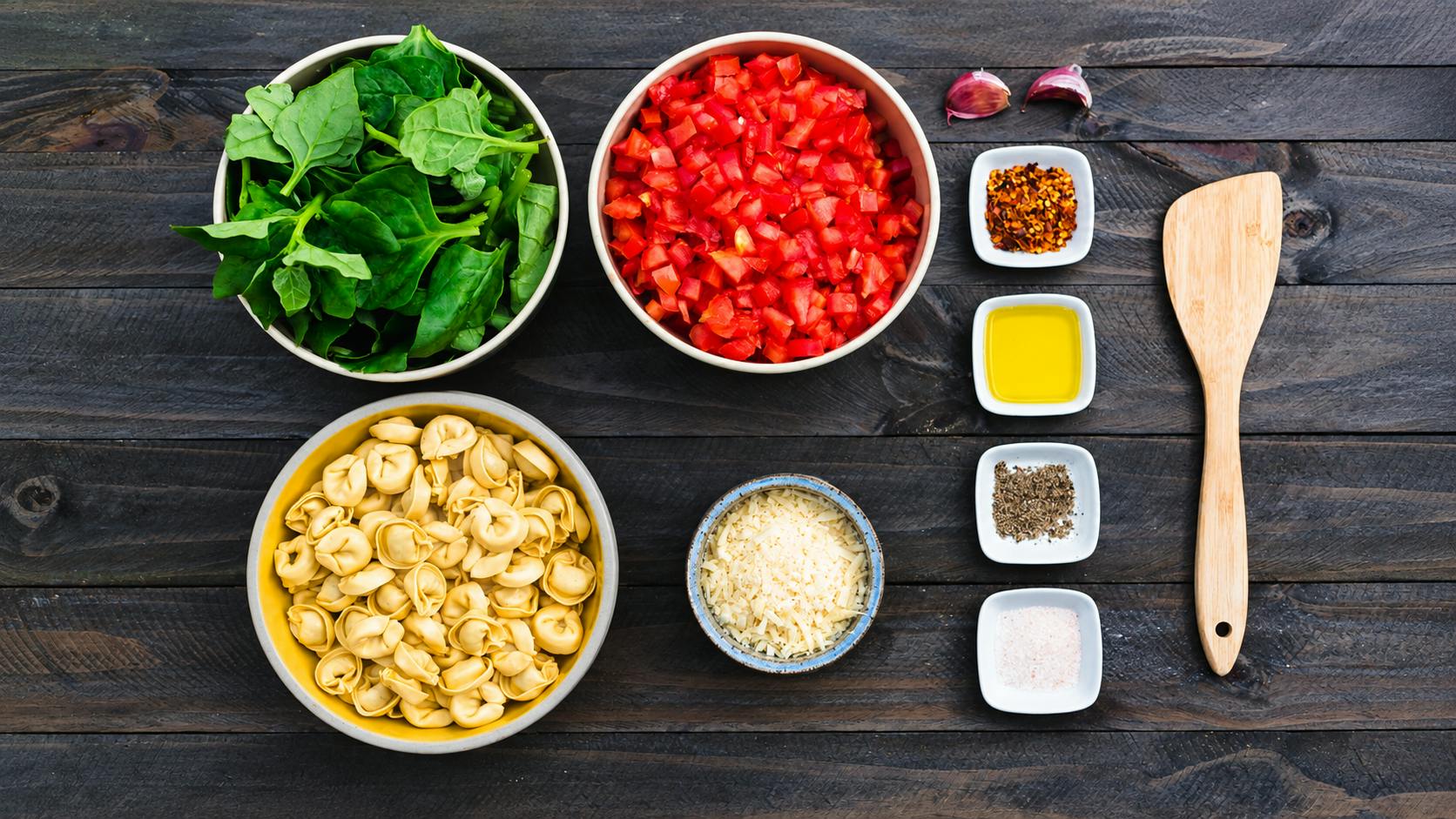 Food mise en place for capeletti with tomato sauce
