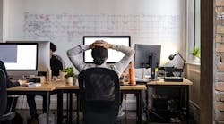 Female working from her home office staring at her computer screen. Female working from her home office staring at her computer screen.