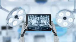 Concept image of robot hands holding dental x-rays at the dentist's office.