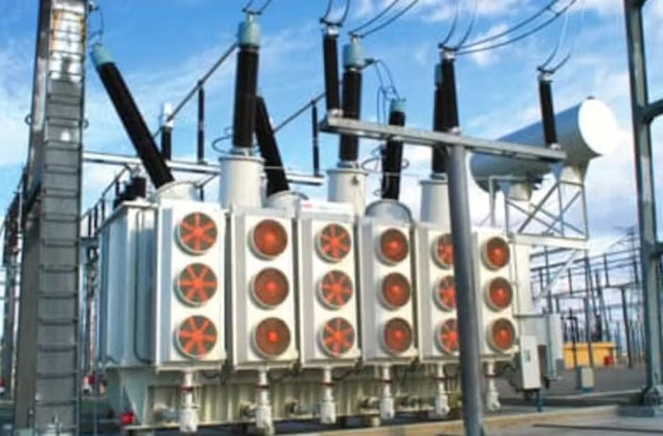 Image of an industrial transformer with blue sky in the background.