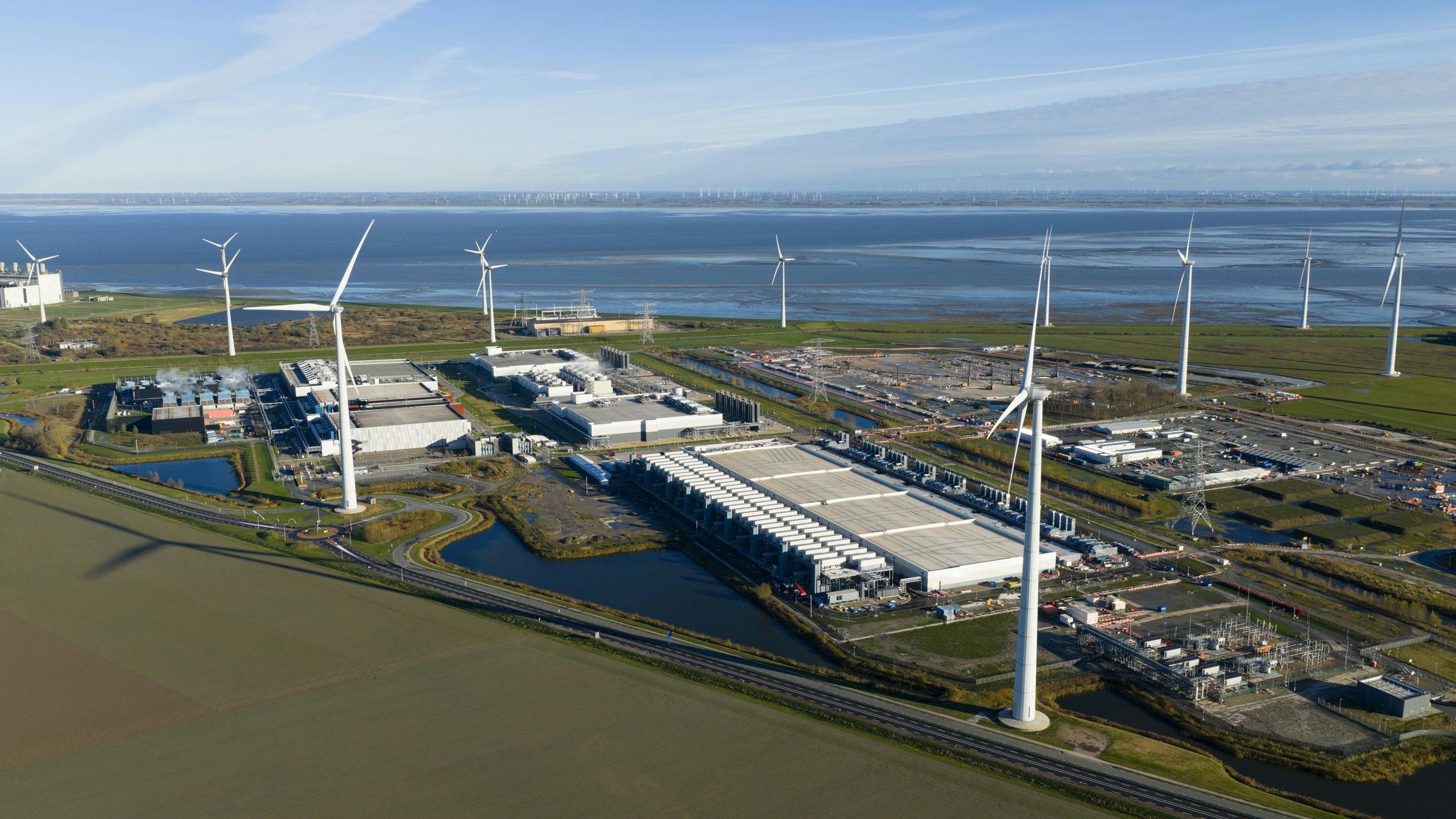 Exterior overview of a new build, hyperscale data center in Eemshaven, Netherlands.