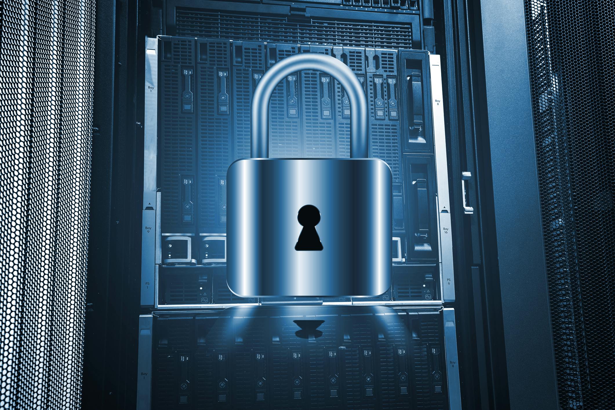 Concept image of a lock in front of a server for cyberattack prevention.