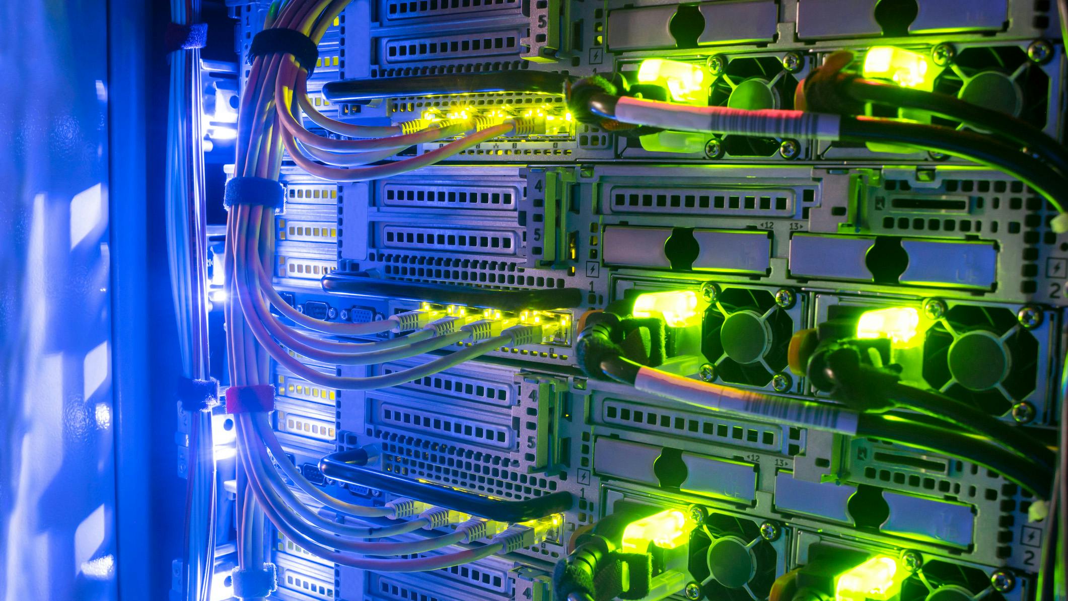 Hosting platform for modern IT resources, including rack with server data storage equipment.