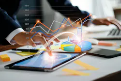 Businessman using tablet and laptop analyzing data for business technology innovation. Businessman using tablet and laptop analyzing data for business technology innovation.