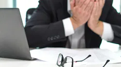 ID 103769618 | Problem © Tero Vesalainen | Dreamstime.com Worried businessman covering face with hands in office.