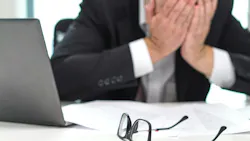ID 103769618 | Problem © Tero Vesalainen | Dreamstime.com Worried businessman covering face with hands in office.