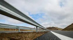 Steel guard rail barrier on the motorway without reflective sign Steel guard rail barrier on the motorway without reflective sign