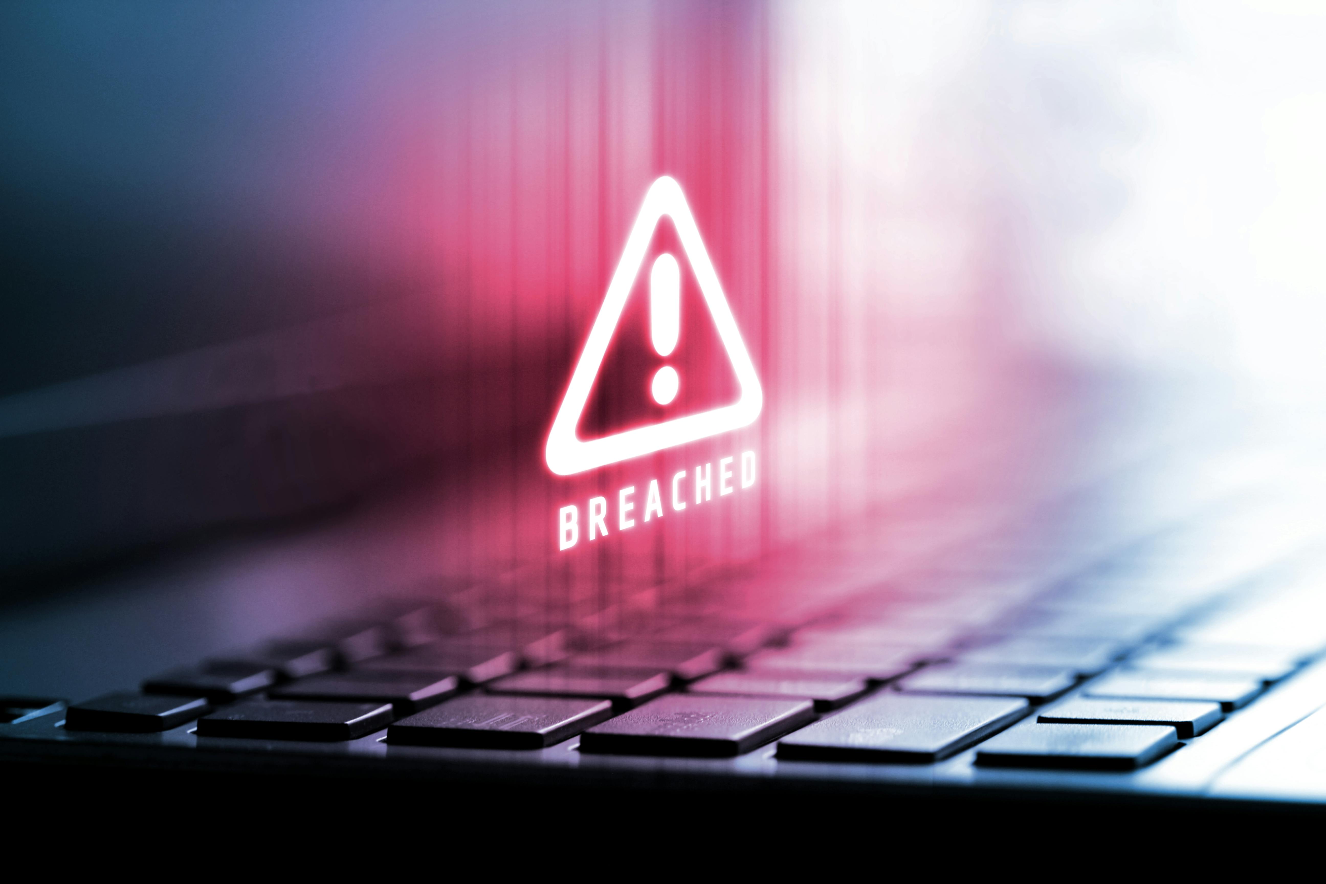 3D Rendering of alert logo on laptop computer. Concept of privacy data being hacked and breached from internet technology threat