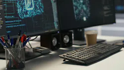 Data center PC screens displays monitoring backend infrastructure performance used in AI model development and automation workloads.